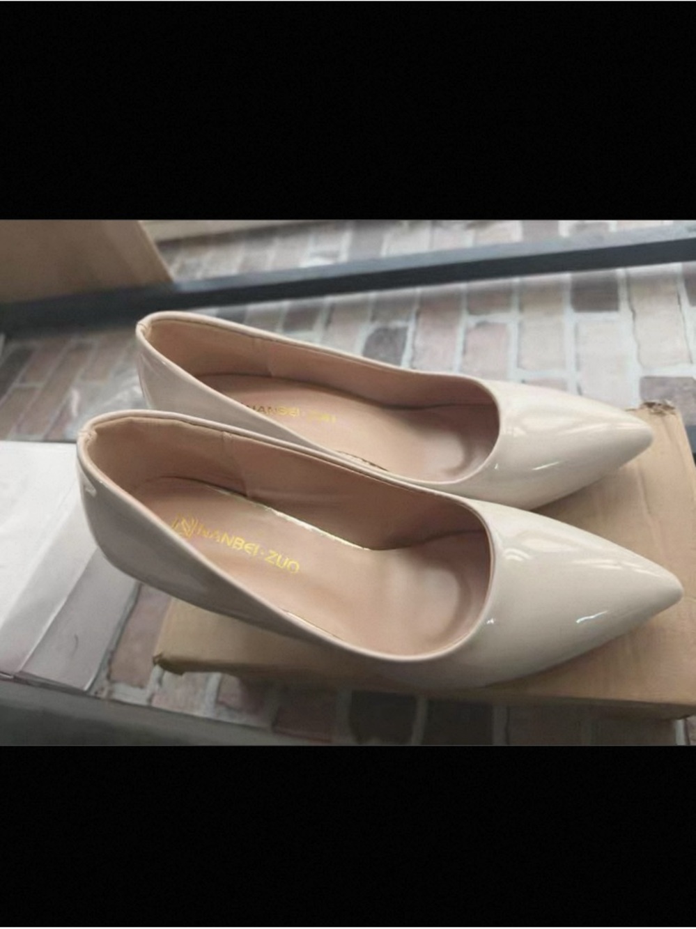 Pointed Toe Patent Pumps in Cream with Subtle Shine